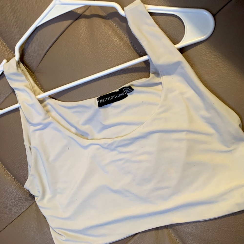 Pretty little thing creamy white top. Size M